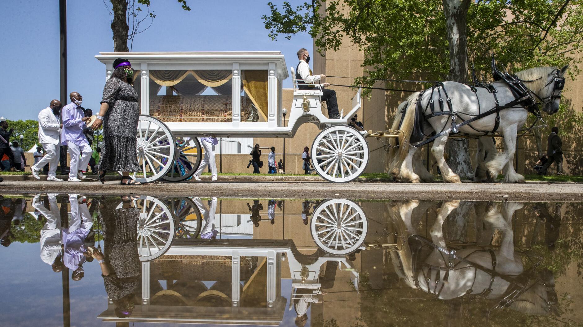 Even in death, this Mardi Gras Indian managed to change clothes